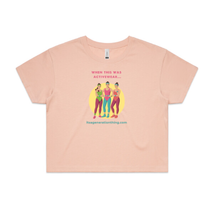 Pink t-shirt with graphic design of three people and text on a white background